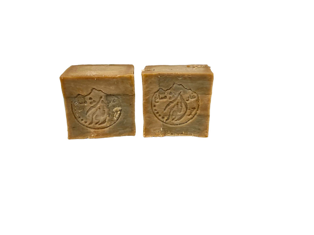 Alkawthar olive oil texture closeup highlights olive oil richness for moisturizing skin.