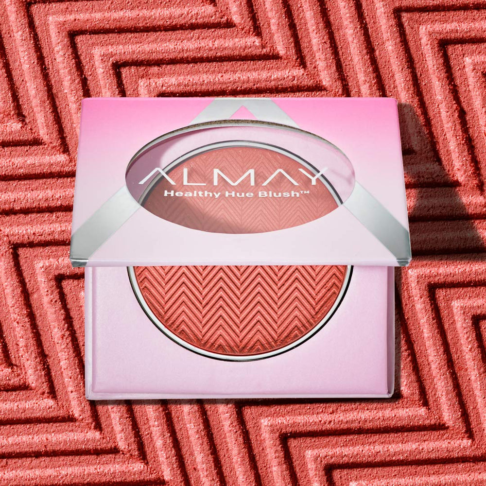 Almay Healthy Hue blush 200 So Peachy cheek swatch reveals buildable color.