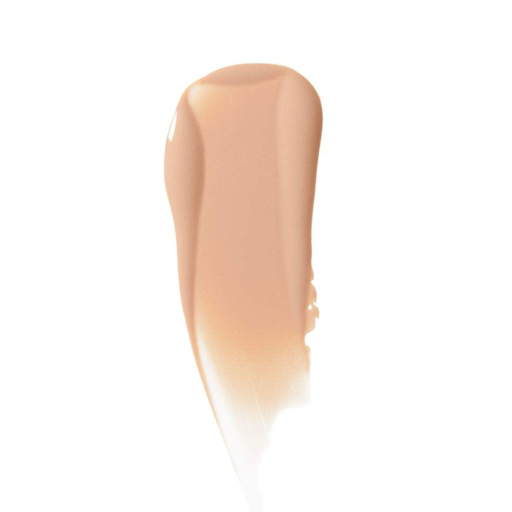 Almay Liquid Foundation blend-swirl—smooth, seamless application for luminous skin.
