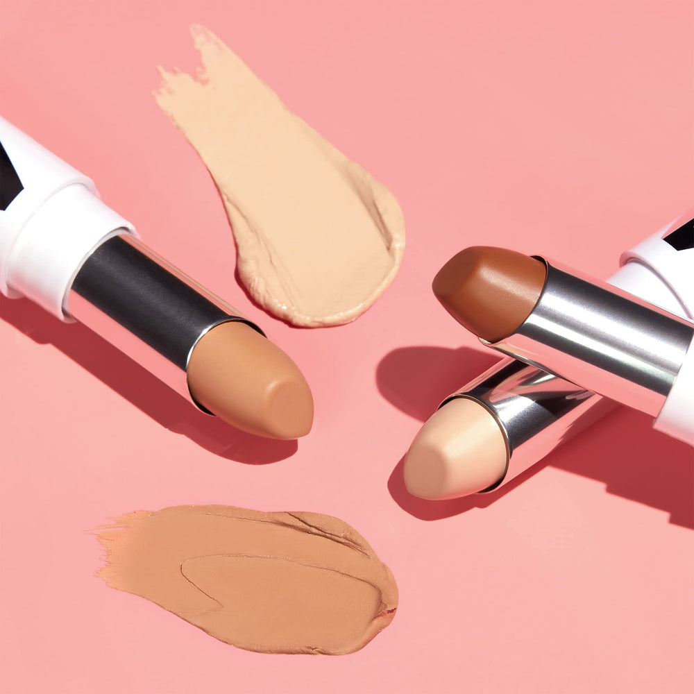 Almay Skin Perfecting Comfort Concealer swatch shows creamy texture for easy blending.