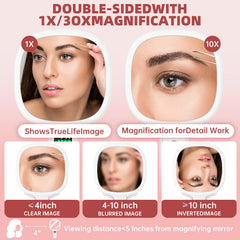 Alovely travel mirror shows 1X magnification for general makeup application.