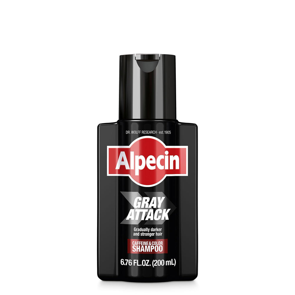 Alpecin Gray Attack shampoo bottle close-up showing natural grey coverage potential