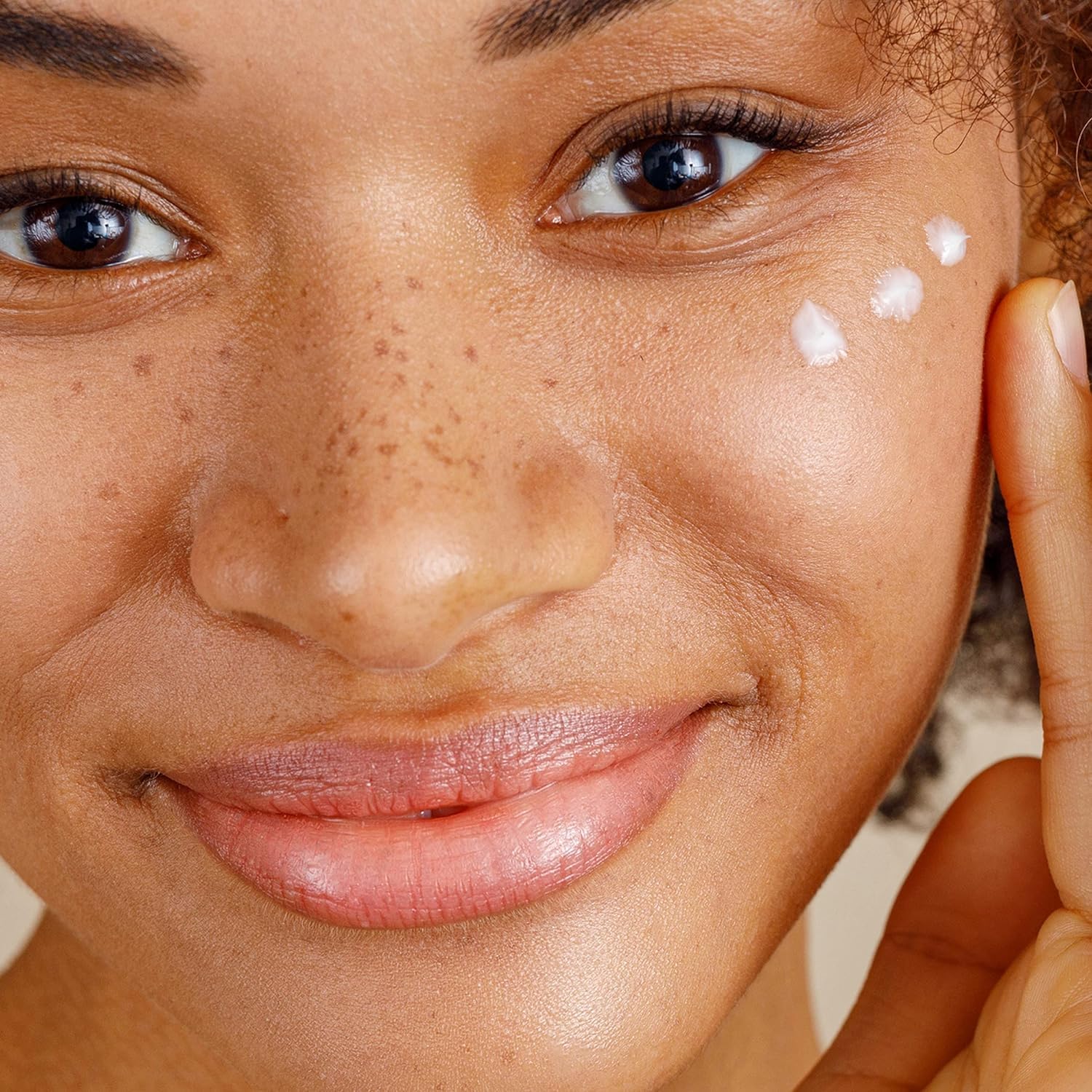 Alpha Skin Care Enhanced Renewal Cream daily application demonstrates gentle exfoliation for radiant skin.