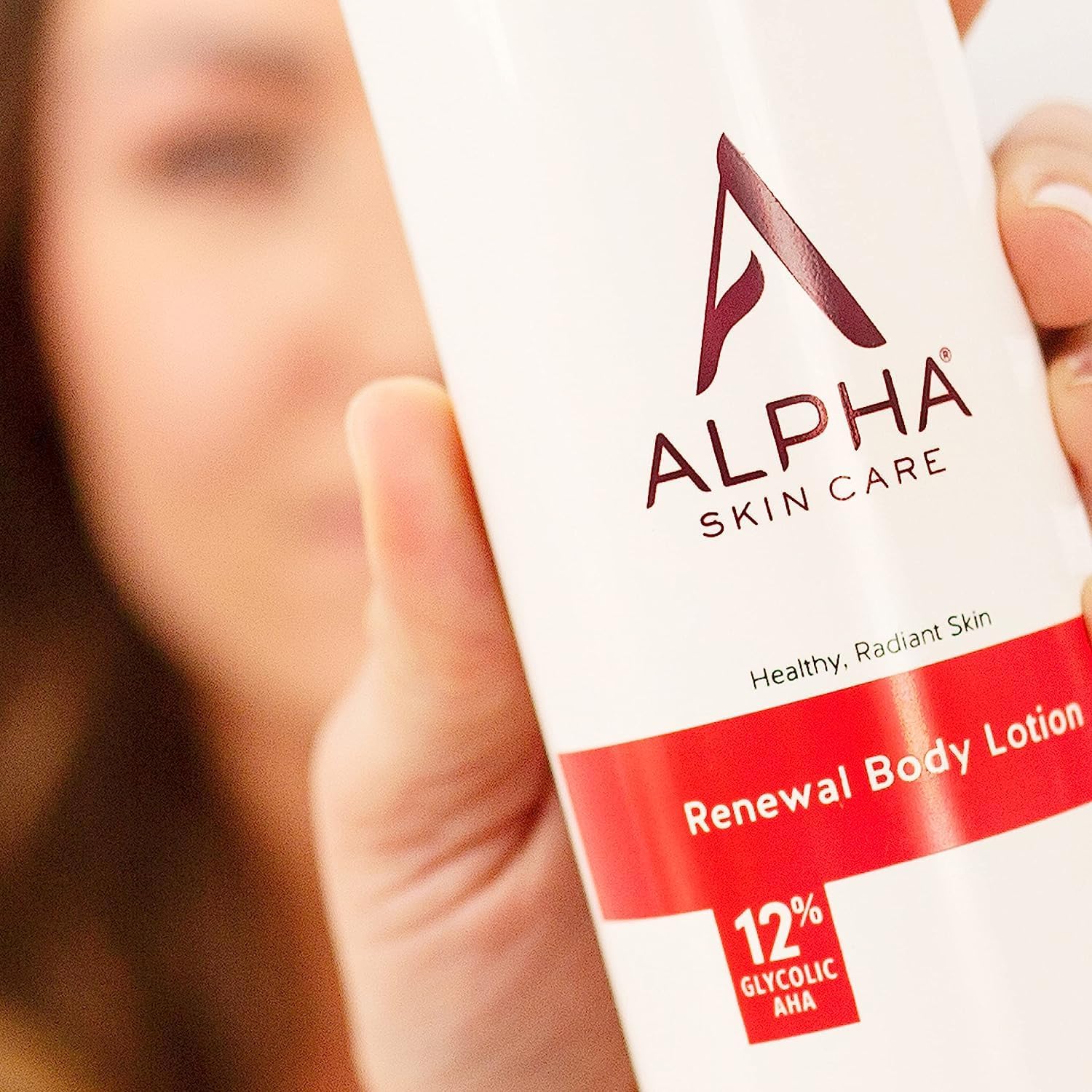 Décolletage closeup with Alpha Skin Care Revitalizing Body Lotion showing even tone potential