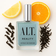 ALT. FRAGRANCES Reality bottle close-up highlighting citrus and tea notes for everyday confidence and presence.