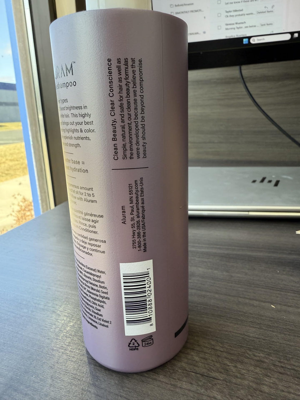 ALURAM coconut water purple shampoo pour shows even coverage for balanced highlights