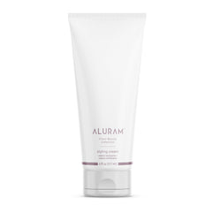 ALURAM Coconut Water Styling Cream bottle front for hydrated, frizz-free definition.