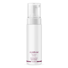 ALURAM Coconut Water Volumizing Foam bottle shows weightless lift for natural-looking volume.