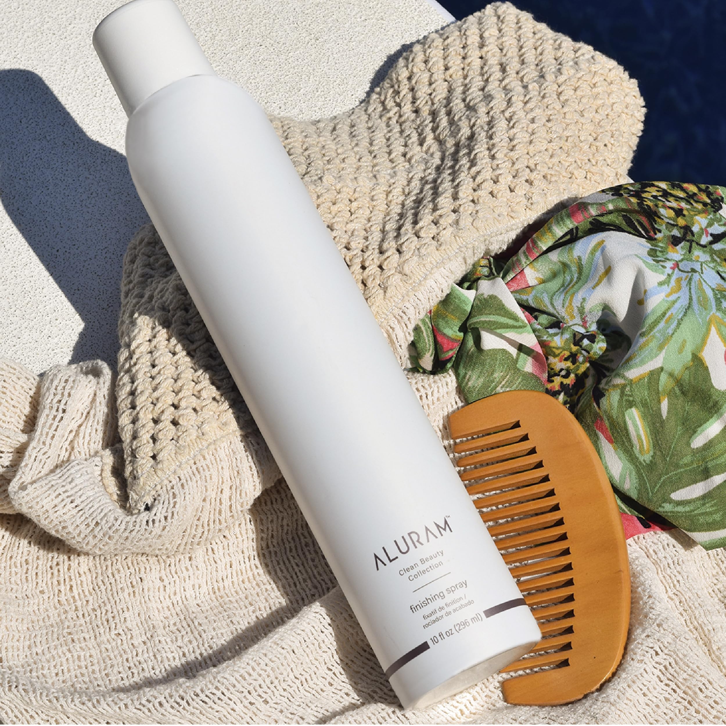 ALURAM Finishing Spray spray mist captures lightweight, buildable hold for versatile styling