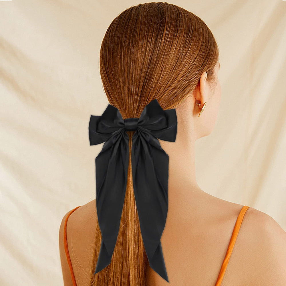 Ambesi Big Bow Hair Clip red long-tail detail highlights satin shine and versatility.