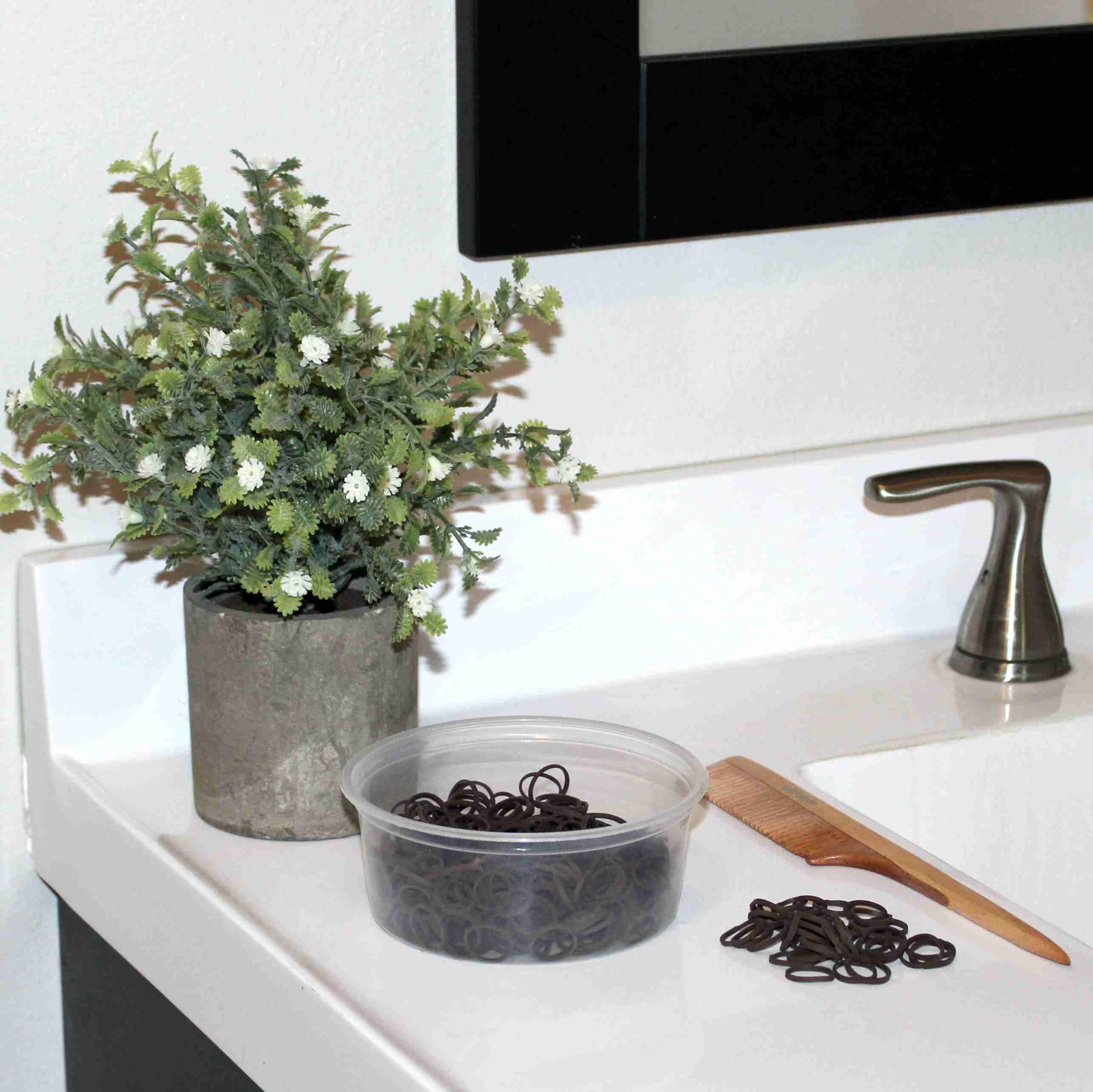 Amelia Beauty re-closable container keeps bands organized and spill-free