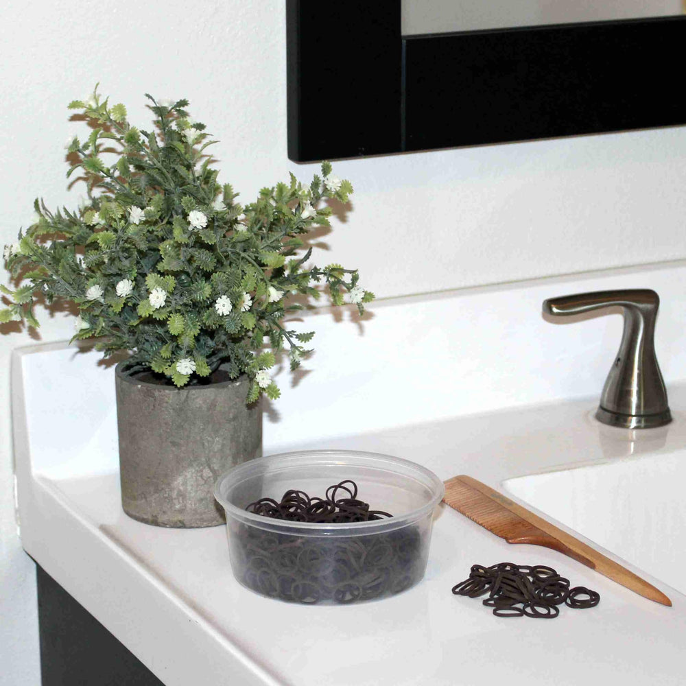 Amelia Beauty re-closable container keeps bands organized and spill-free