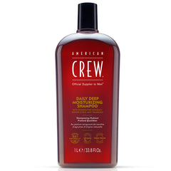 American Crew Deep Moisturizing Shampoo bottle pour delivers a conditioning cleanse for dry hair.