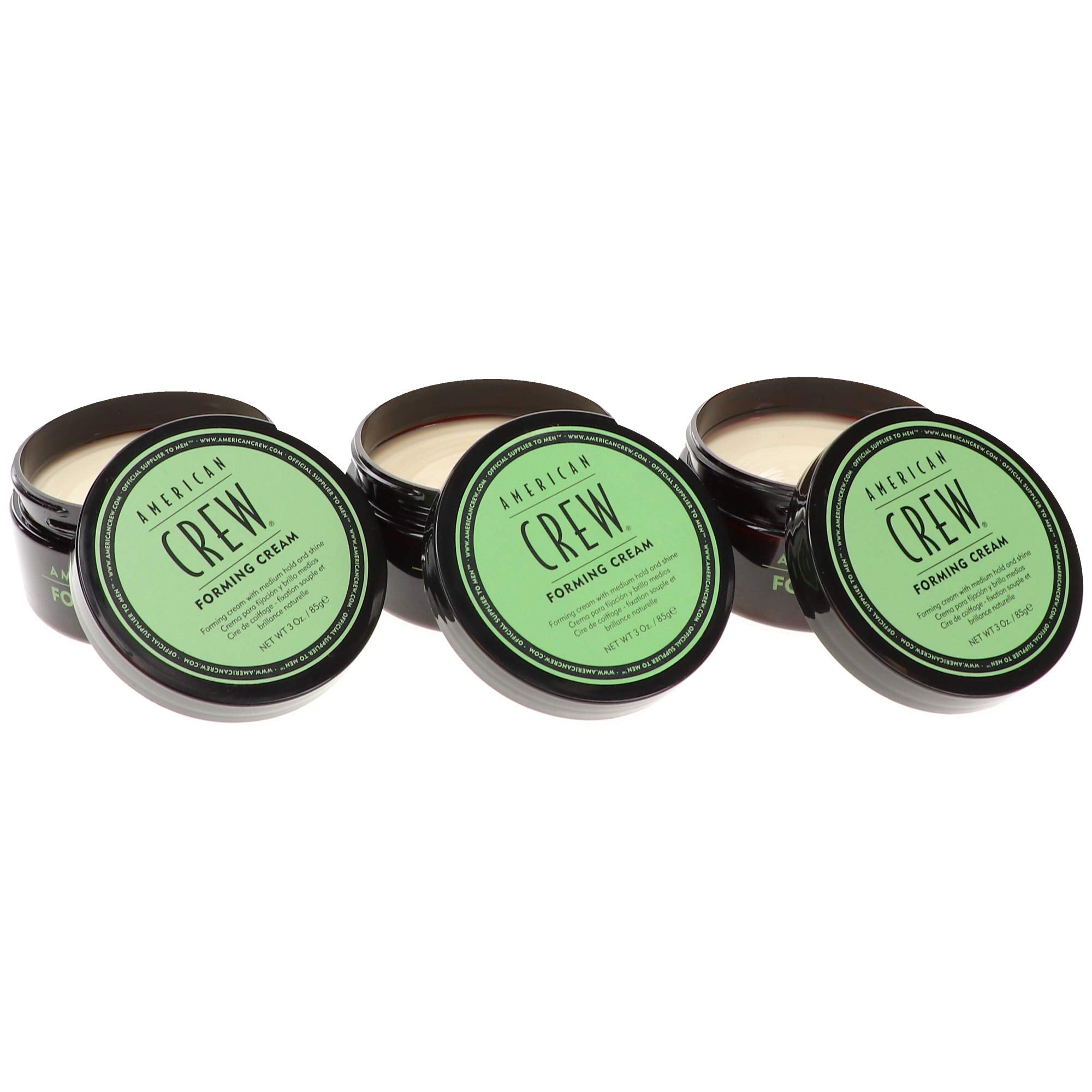 Applying American Crew Forming Cream for effortless styling on all hair types.