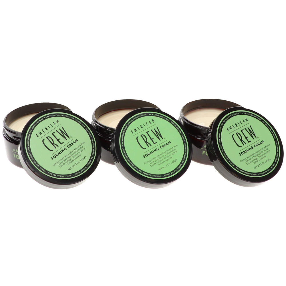 Applying American Crew Forming Cream for effortless styling on all hair types.