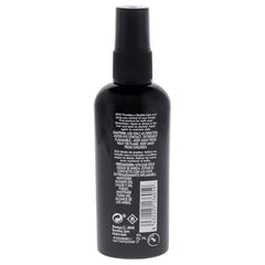 American Crew Hair Spray being washed out easily with shampoo for a clean slate.