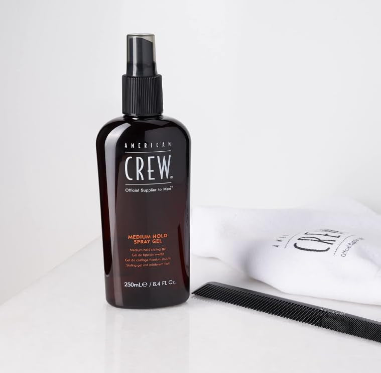 American Crew medium hold gel texture in hand demonstrating light, non-sticky feel.