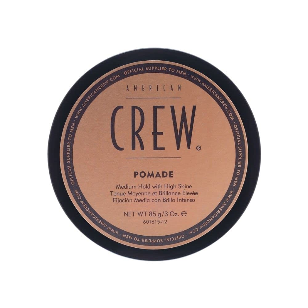 American Crew pomade 85g tube closeup showing versatile hold and high shine styling.