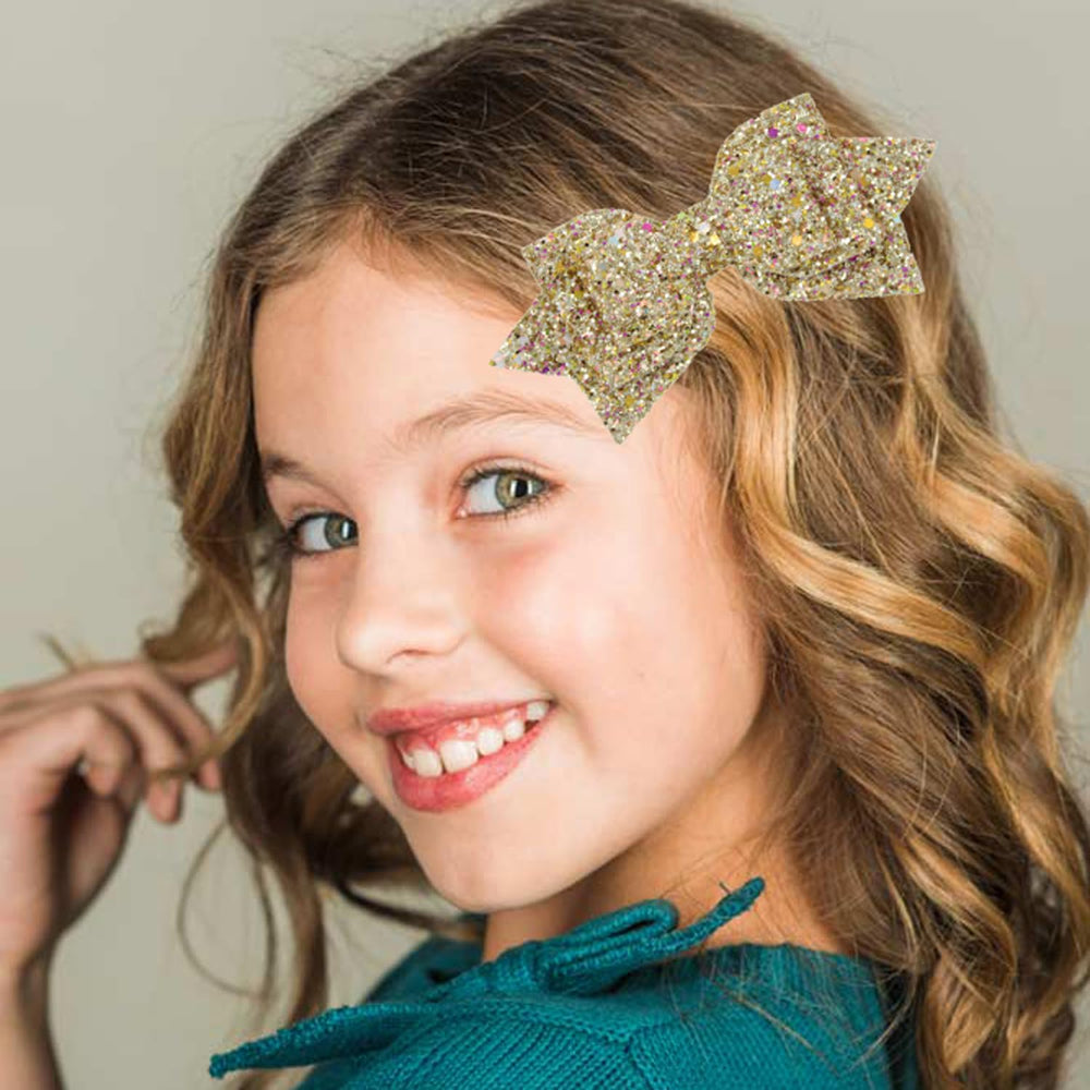 Amybasic alligator-clip bows included to secure hair for girls of all ages.