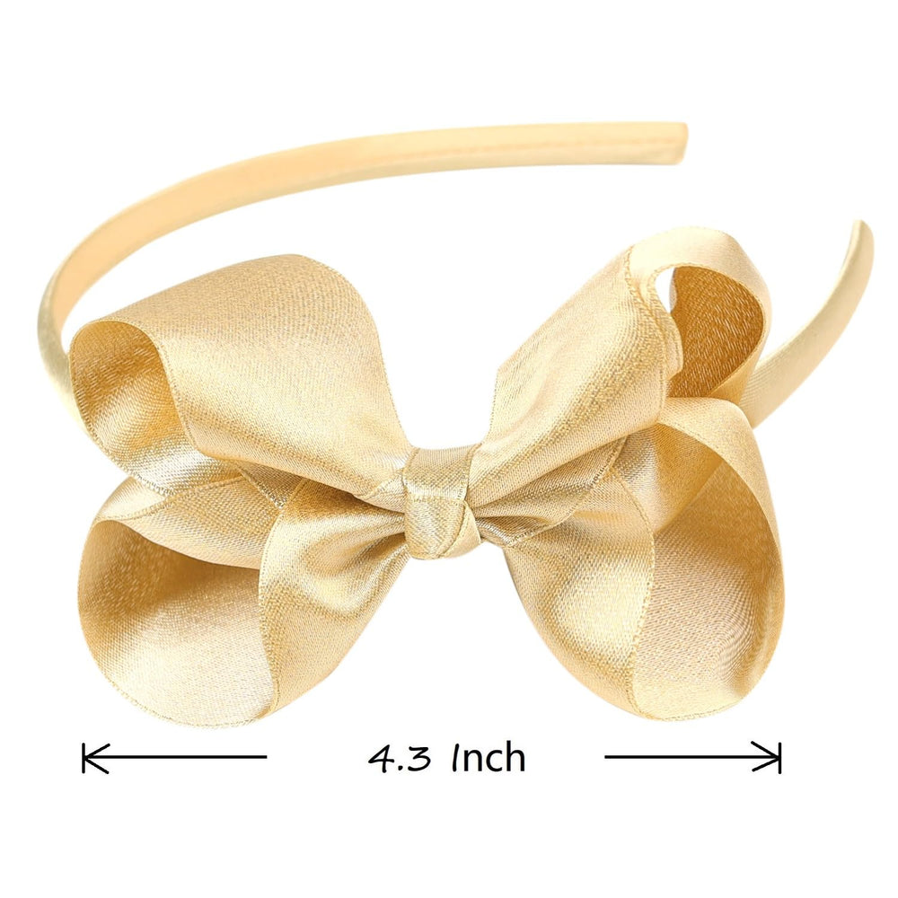 Amybasic gift-ready sparkly bow headband ideal for birthdays and holidays.