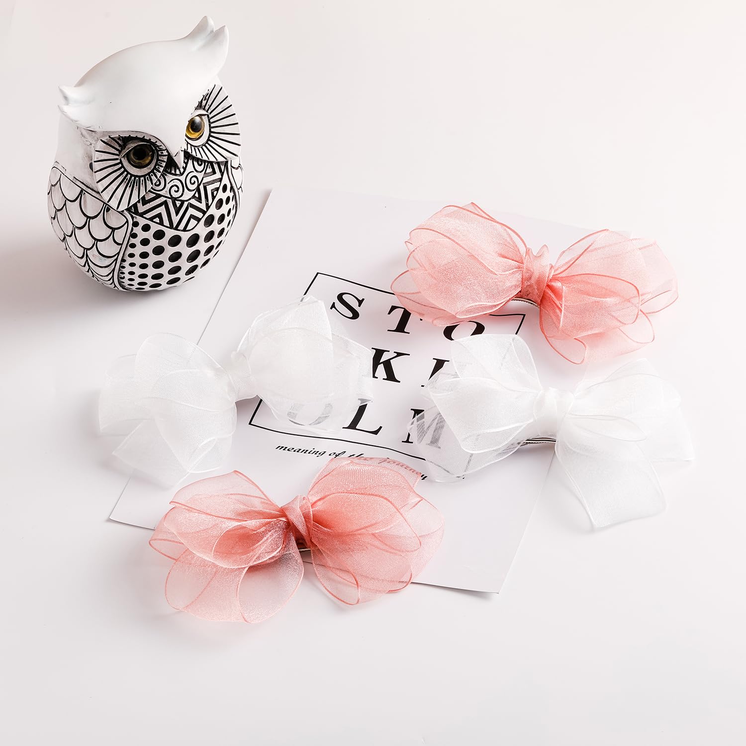 Amybasic girls white bow clip adds instant charm to school outfits.