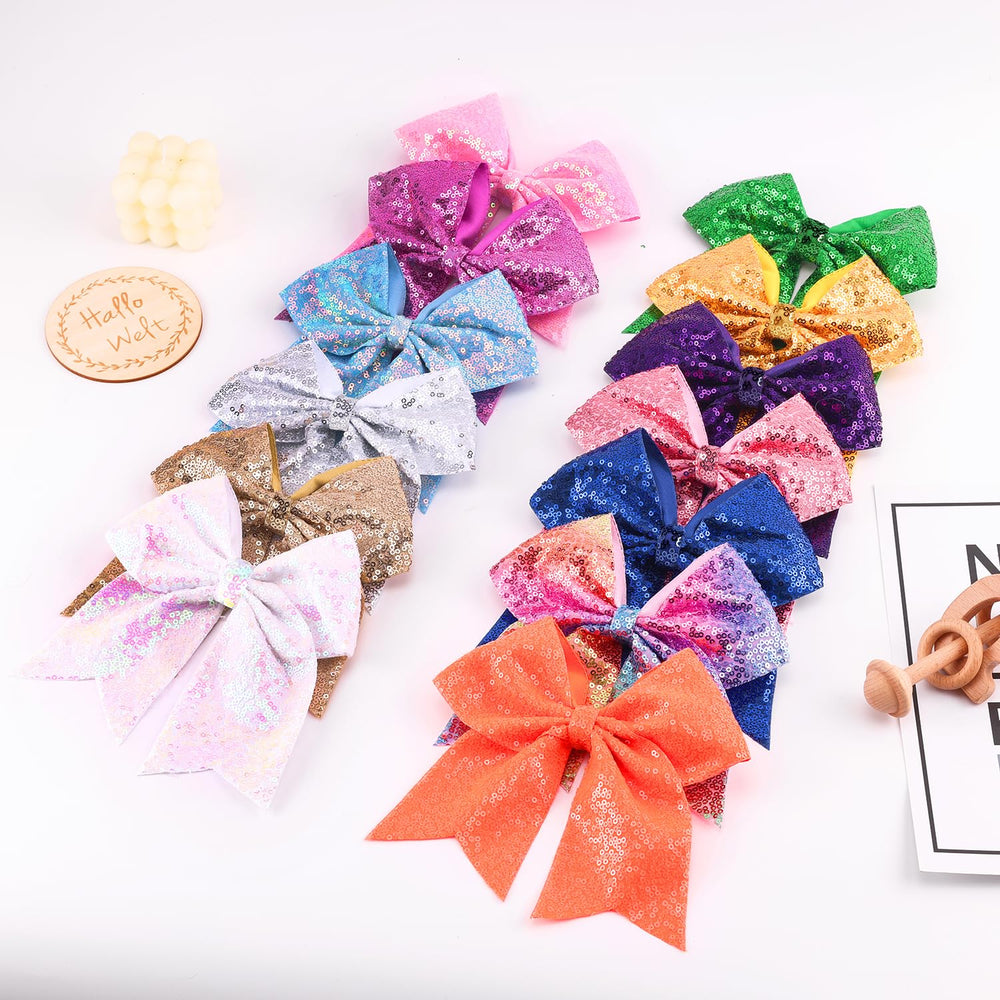 AMYDECOR 7-inch bow adds dramatic flair with sequin shimmer for performances.