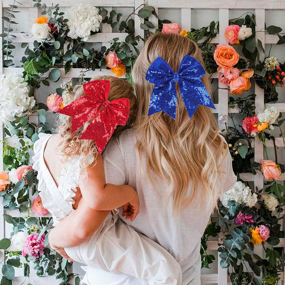 AMYDECOR cheer bow clip adorns backpacks and lockers with festive sparkle.
