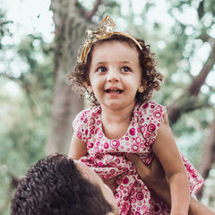 AmyDecor gold sequin bow headband closeup reveals soft ribbon texture