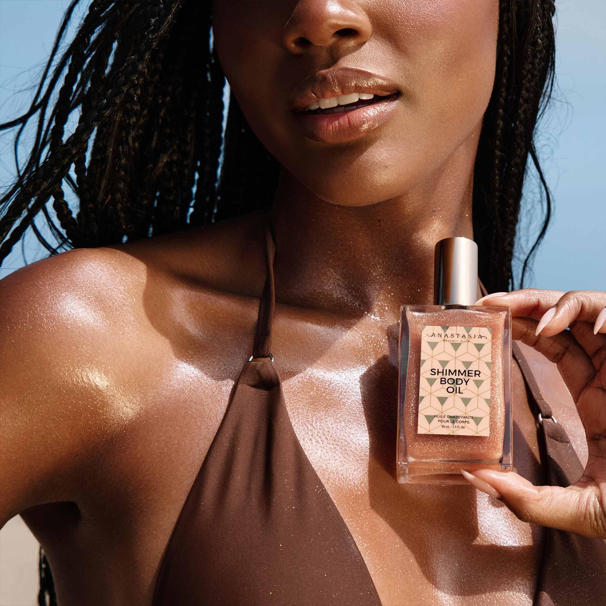 Anastasia Beverly Hills Shimmer Body Oil Rose Gold swatch on skin for balanced sheen.