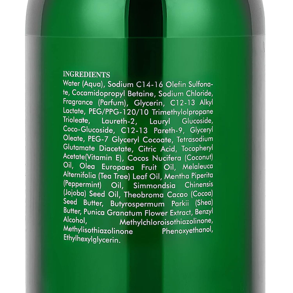 Fresh mint leaves beside AnatoliaDaphne Tea Tree Body Wash bottle for refreshing scent