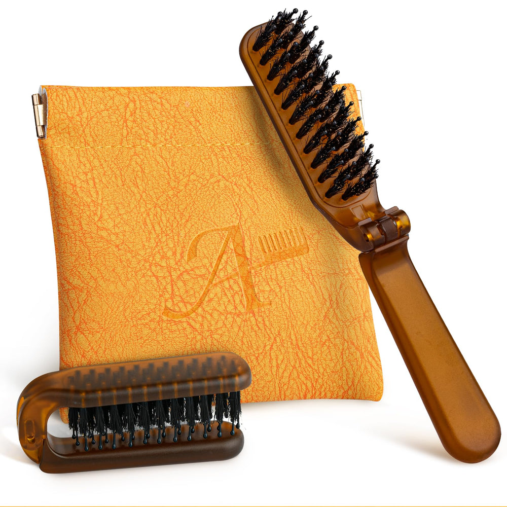 Ancable folding travel brush shown in compact form for on-the-go styling