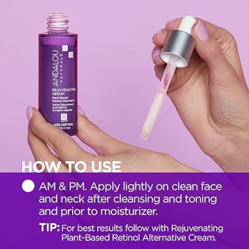 Andalou Naturals serum dropper dispensing a precise amount for targeted application.