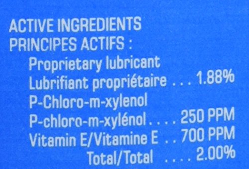 Andis Blade Care Plus Dip Jar bottle close-up highlighting convenient blade maintenance features