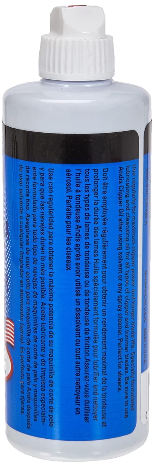 Andis clipper oil application on blades highlights reduced friction and quieter performance.