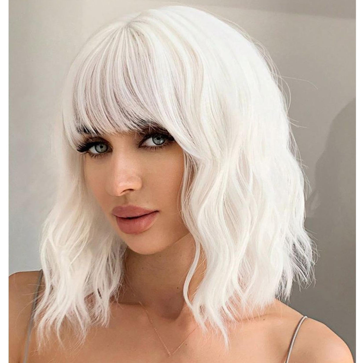 Andromeda White Wavy Wig with Bangs front view for everyday versatility