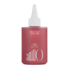 ANILLO Rosy Night ampoule bottle demonstrates quick-absorb formula for protected, hydrated hair.