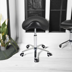 Antlu saddle stool rolling chair side view demonstrates easy height adjustment for varied workspaces