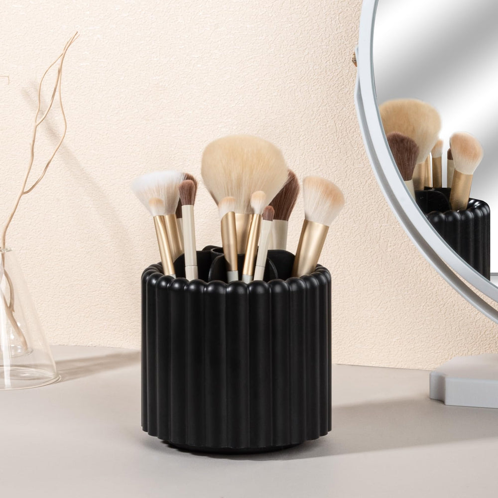 Anyoifax rotating base with non-slip pads keeps the cosmetic display steady during use.