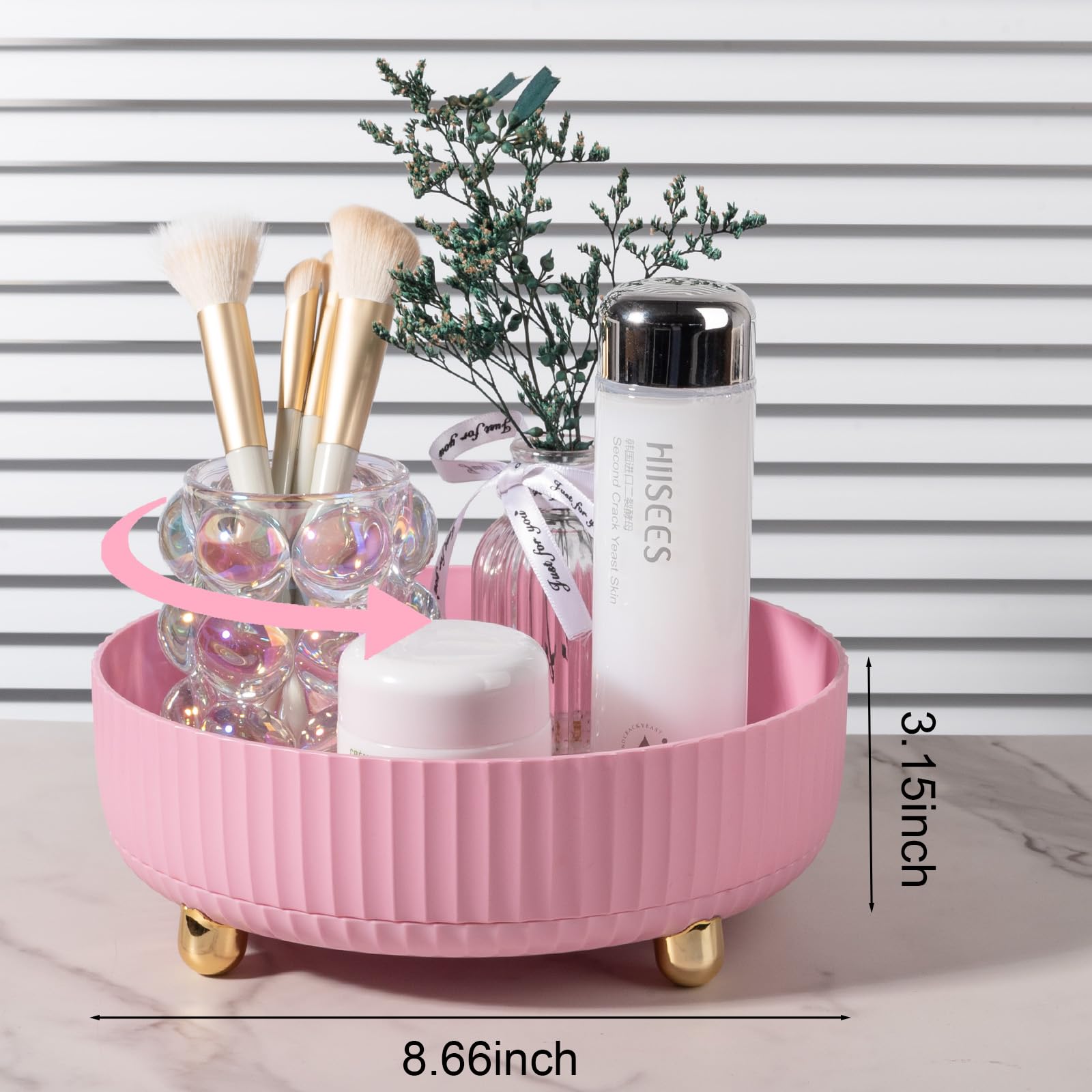 Anyoifax rotating cosmetics storage on a dresser keeps items neatly visible.
