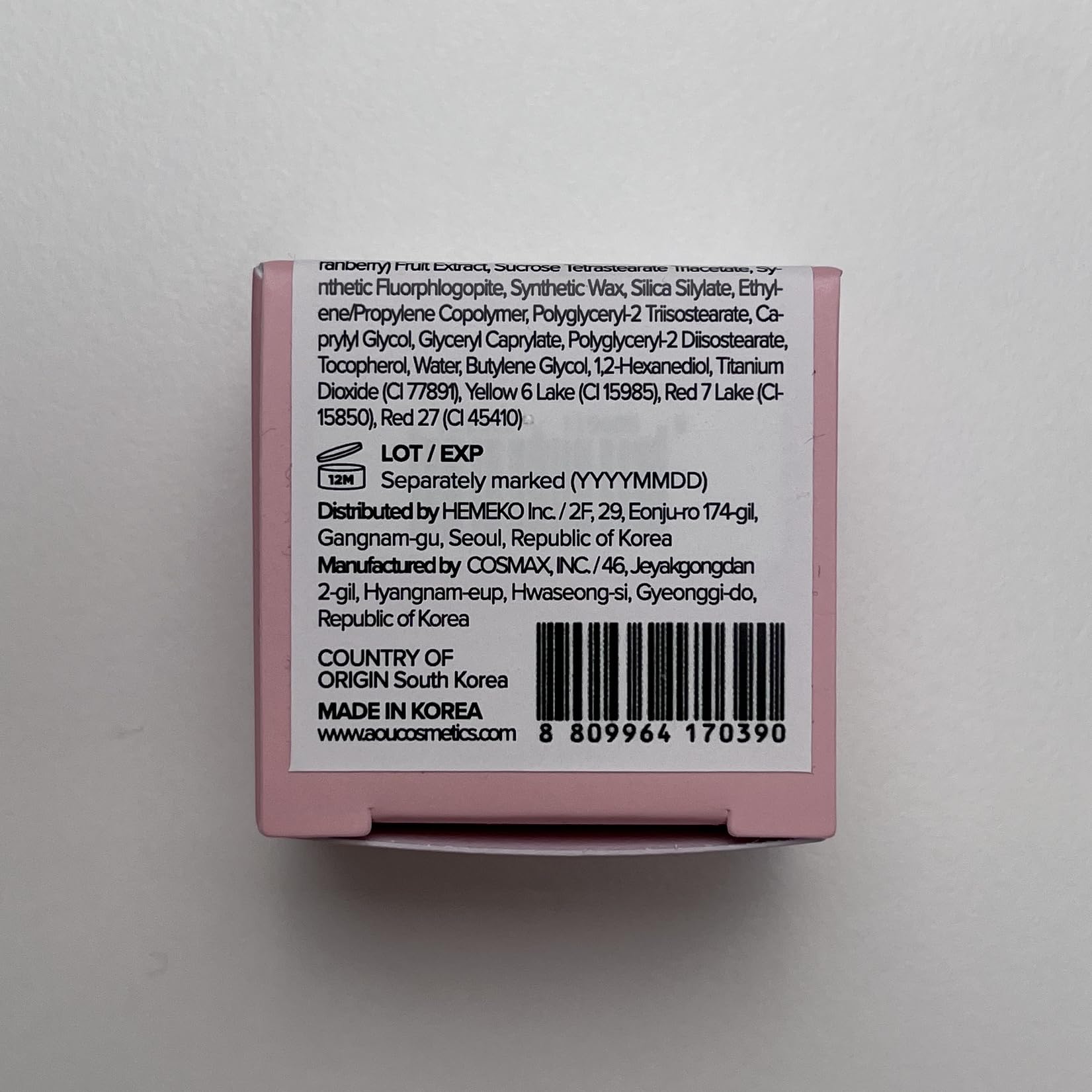 AOU Glowy Tint Balm Apple Balm on lips with glossy finish close-up.