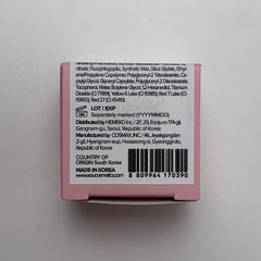 AOU Glowy Tint Balm Apple Balm on lips with glossy finish close-up.