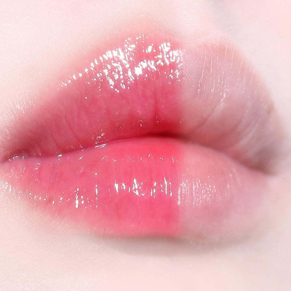 AOU Glowy Tint Balm Apple Balm ingredients close-up with fruit extracts.