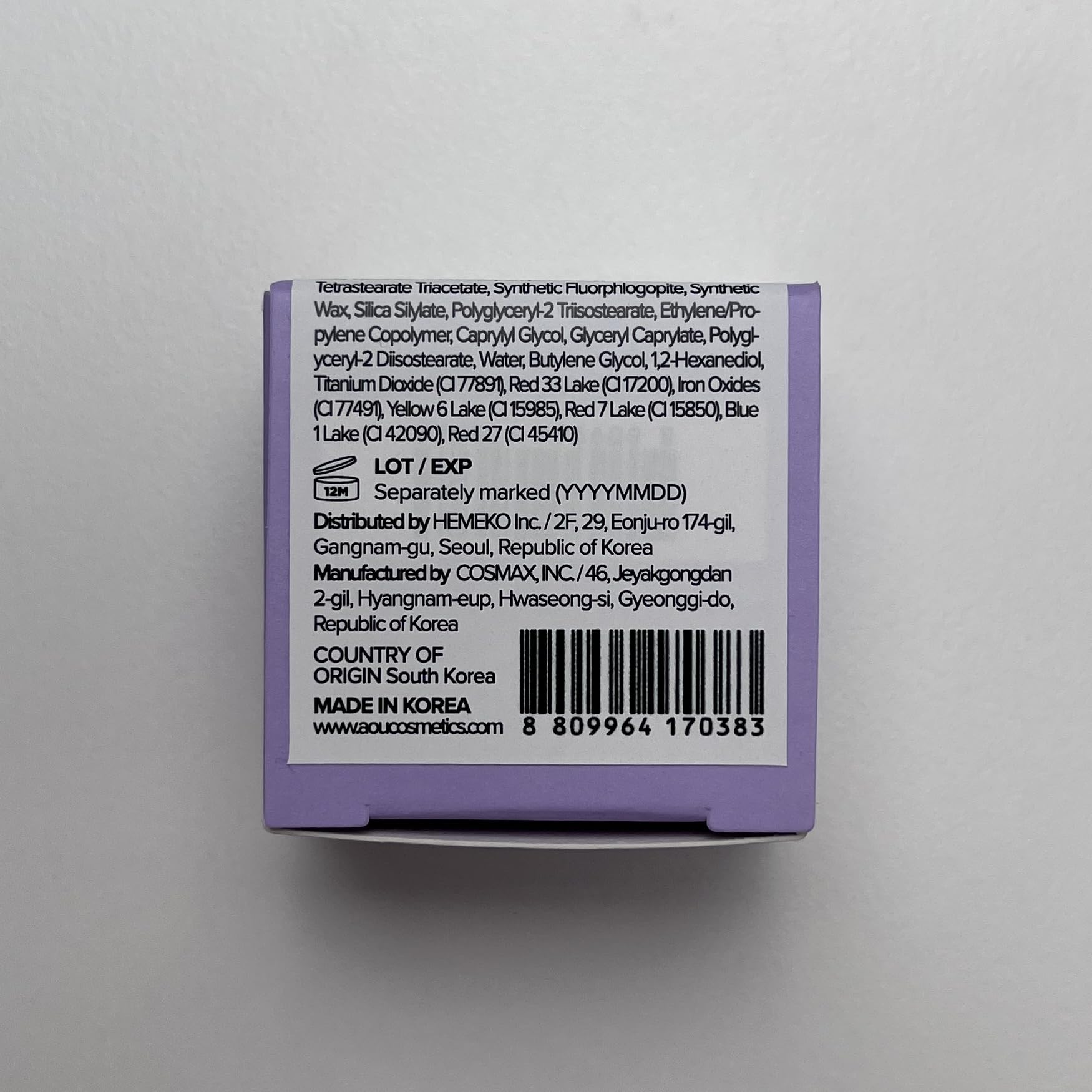 AOU Glowy Tint Balm fruit-ingredient detail emphasizes natural extracts supporting moisture.
