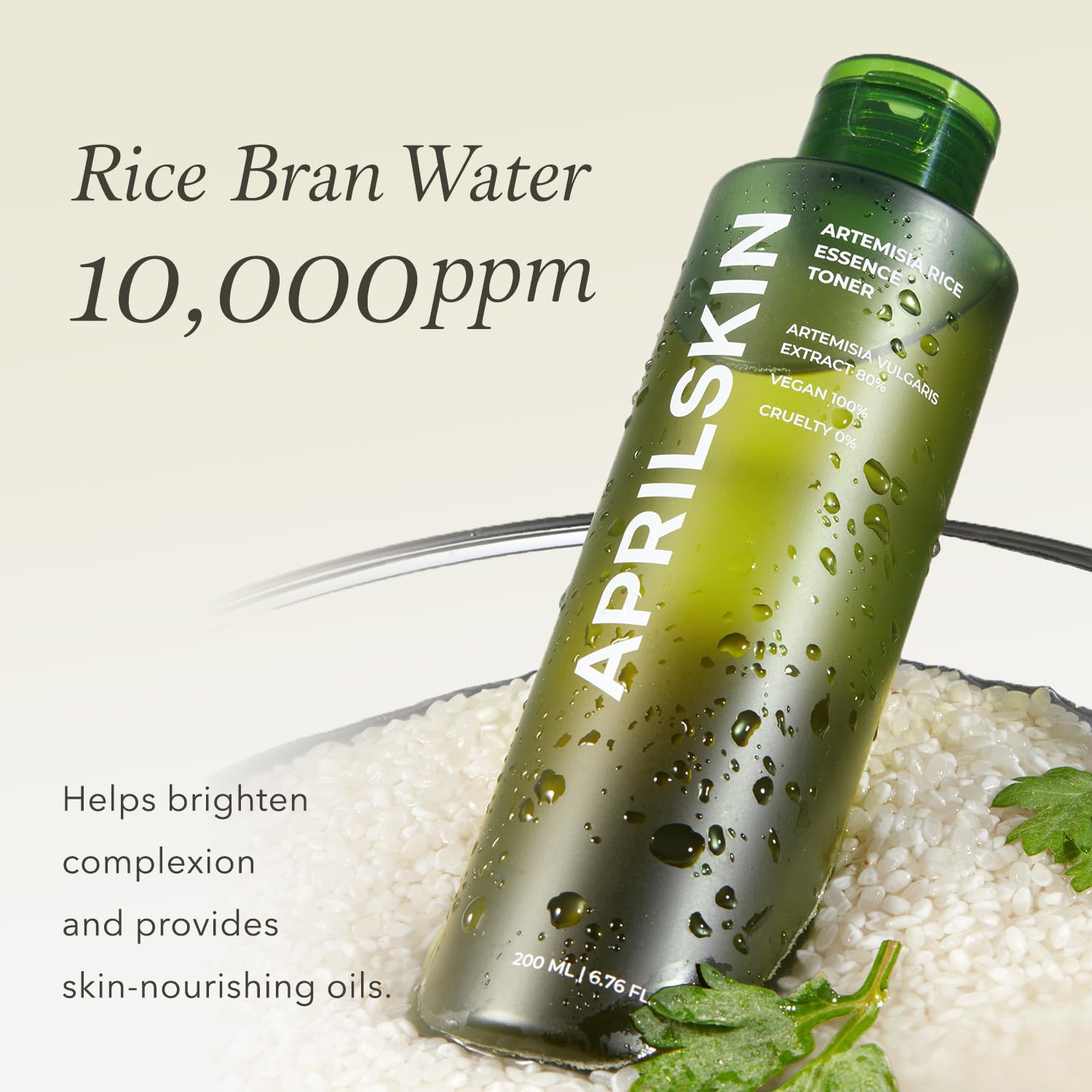 APRILSKIN Artemisia Korean Rice Toner hands applying a few drops for layered hydration.