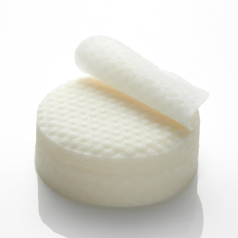 APRILSKIN Calendula PHA Toner Pads on skin showing hydration and refined pores.
