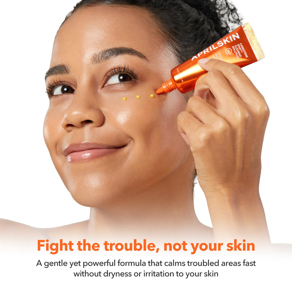 APRILSKIN Carrotene IPMP clearing solution applied to acne-prone skin.