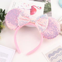 AQOKKA mouse ears headband bow closeup highlights durable, stiff ears and premium bow.
