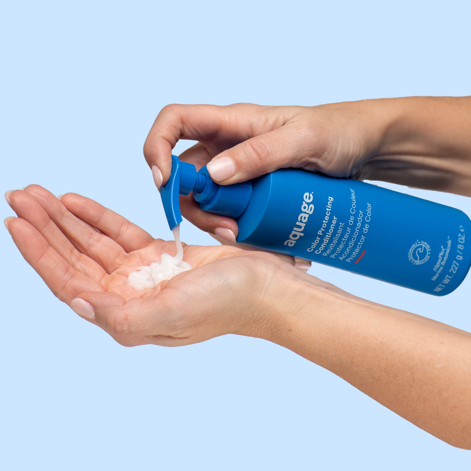Aquage Color Protecting Conditioner pump action demonstrates easy even distribution.