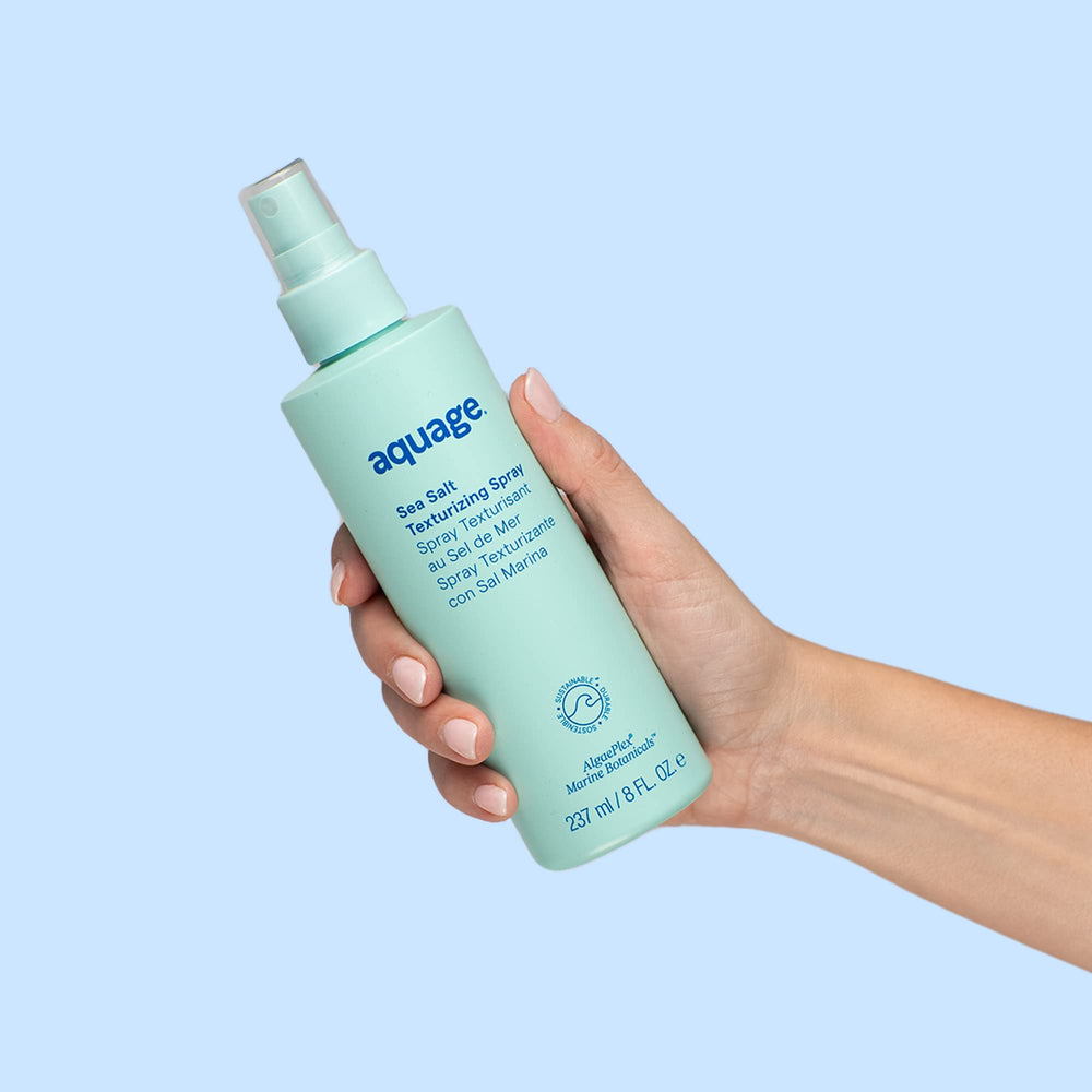 Aquage Sea Salt Texturizing Spray application on model hair highlights unisex appeal.