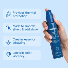 Applying Aquage SeaExtend Silkening Oil Treatment on hair for silkier, smoother strands